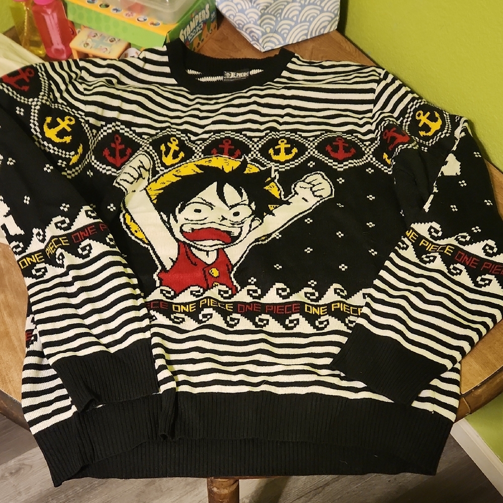 Onepiece Black and White Crewneck Sweater with Red Accents
